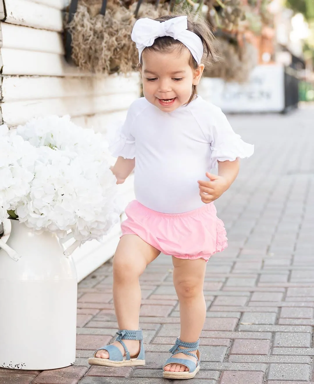 RuffleButts® Baby/Toddler Girls Ruffled Woven Bloomer
